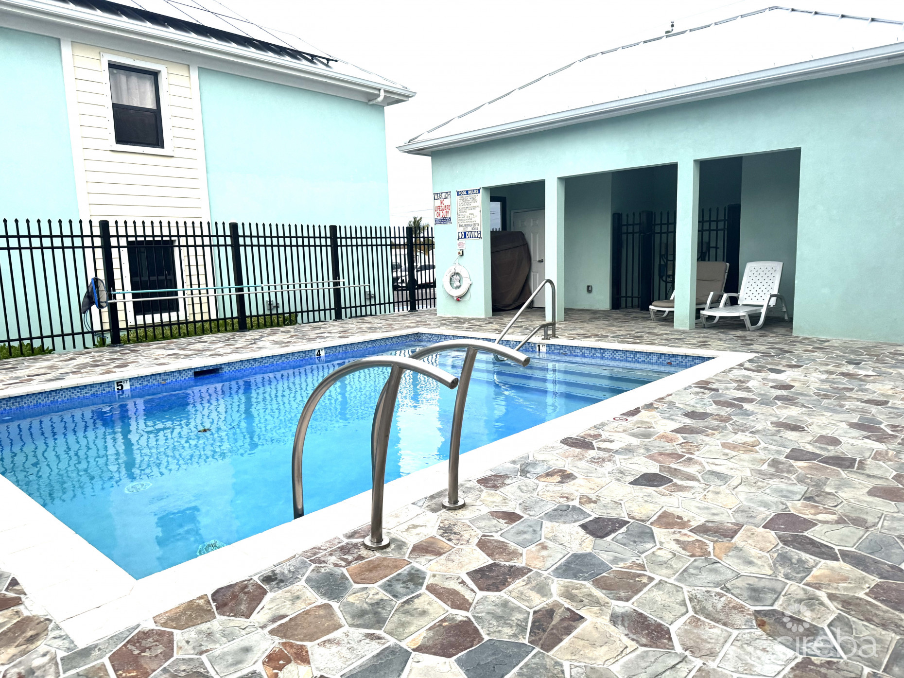 INCOME-PRODUCING RESIDENTIAL PORTFOLIO --4 STUDIOS IN WEST BAY