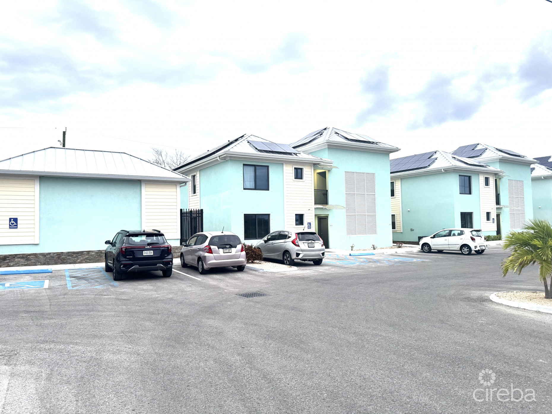 INCOME-PRODUCING RESIDENTIAL PORTFOLIO --4 STUDIOS IN WEST BAY