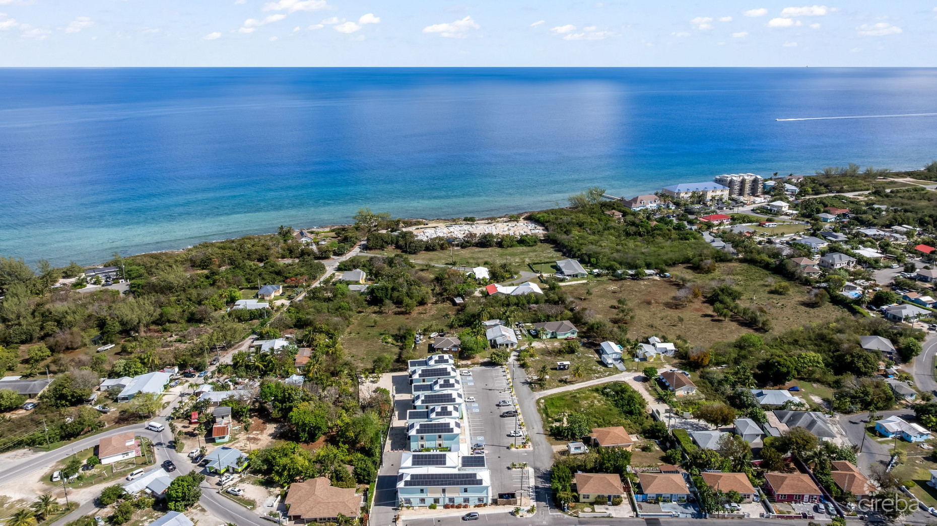 INCOME-PRODUCING RESIDENTIAL PORTFOLIO --4 STUDIOS IN WEST BAY