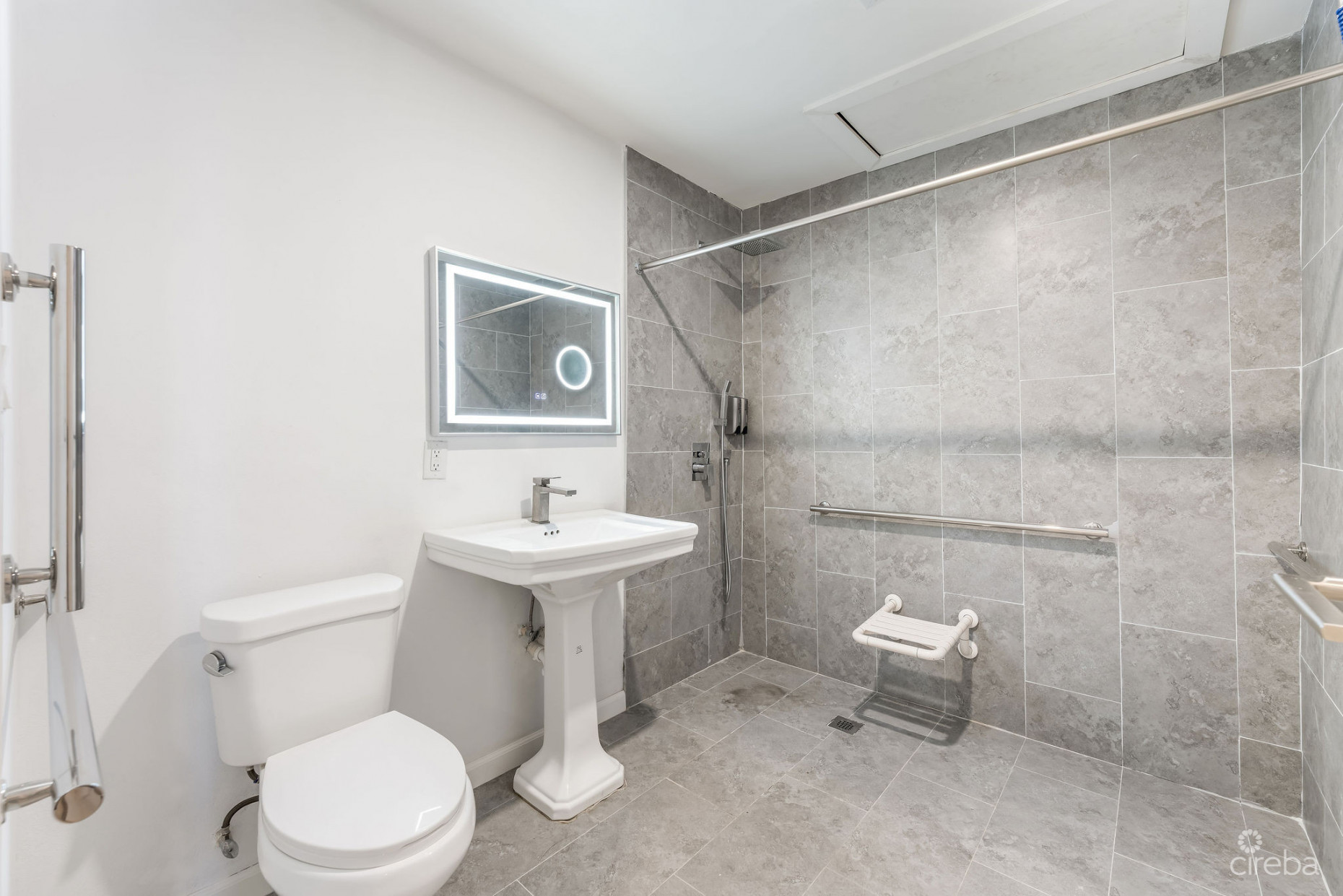 INCOME-PRODUCING RESIDENTIAL PORTFOLIO --4 STUDIOS IN WEST BAY