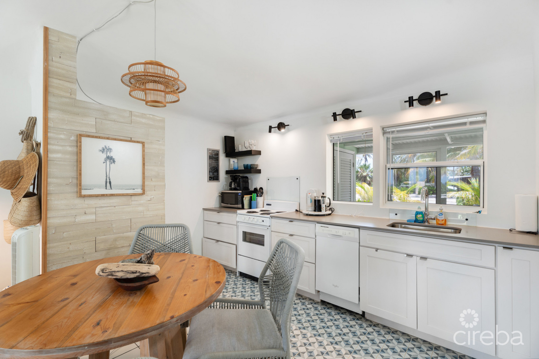 CAYMAN KAI SEA LODGE #13 BEACHFRONT CONDO WITH IMPRESSIVE RENTAL HISTORY