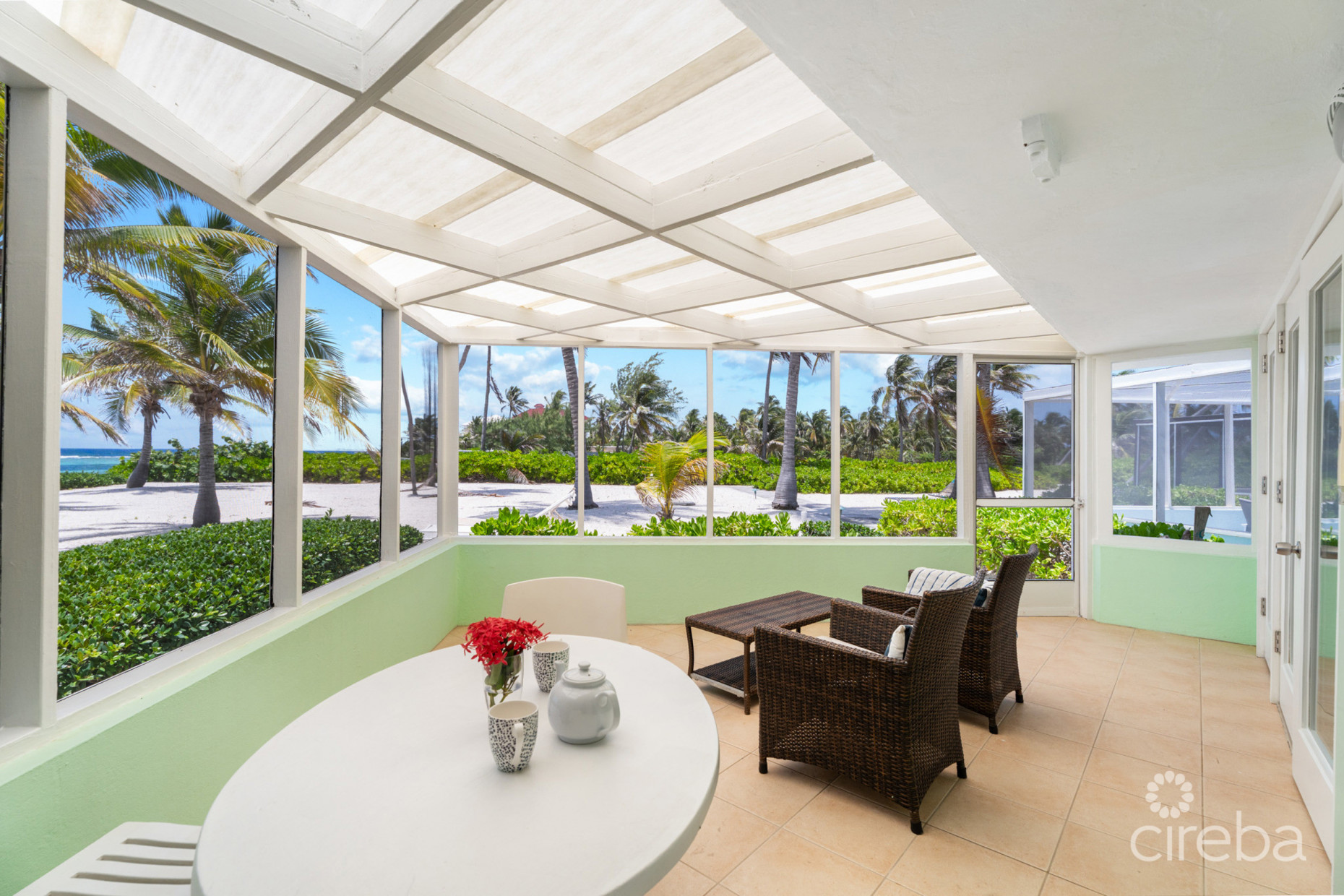 CAYMAN KAI SEA LODGE #13 BEACHFRONT CONDO WITH IMPRESSIVE RENTAL HISTORY