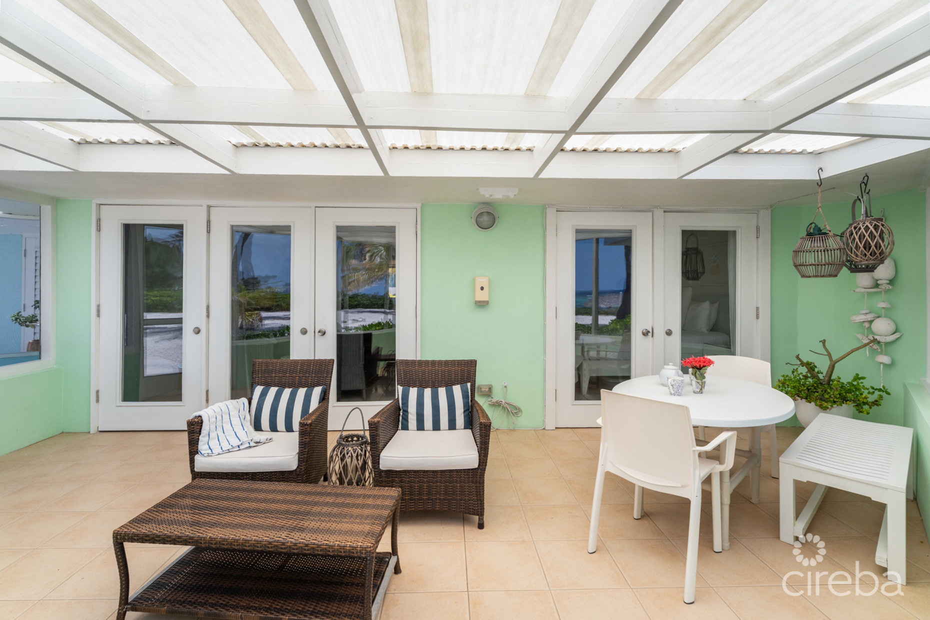 CAYMAN KAI SEA LODGE #13 BEACHFRONT CONDO WITH IMPRESSIVE RENTAL HISTORY