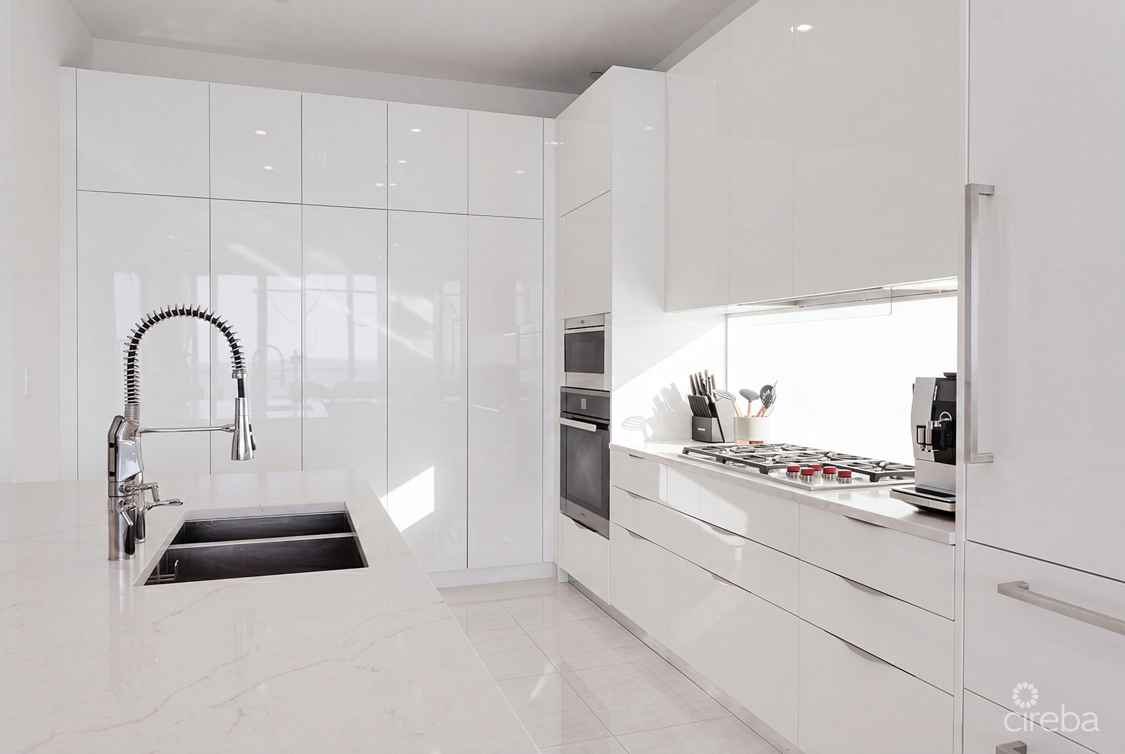 THREE-LEVEL OCEANFRONT FIN PENTHOUSE  #30 PLUS 2 GARAGES