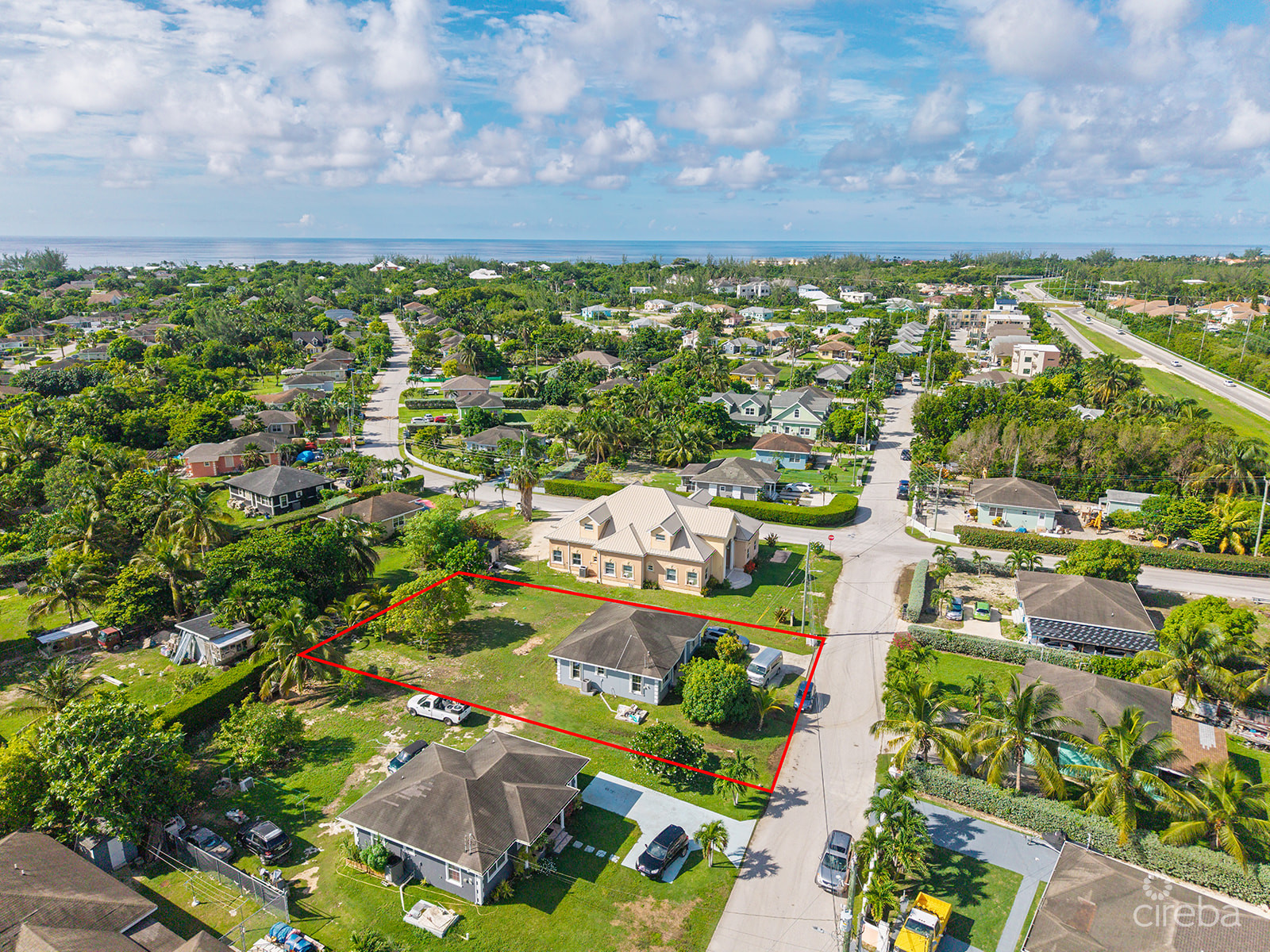 3 BEDROOM HOME ON DUPLEX LOT W/APPROVED PLANS FOR  ADDITIONAL 4-BEDROOM HOME