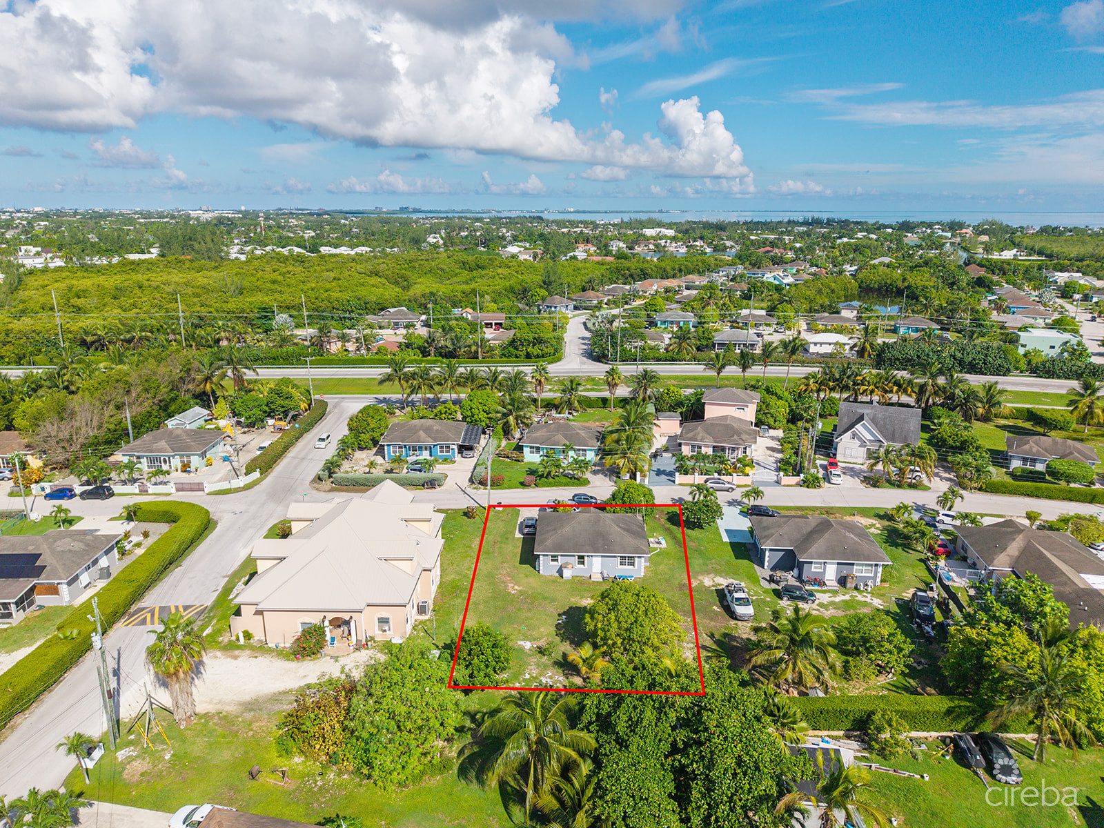 3 BEDROOM HOME ON DUPLEX LOT W/APPROVED PLANS FOR  ADDITIONAL 4-BEDROOM HOME