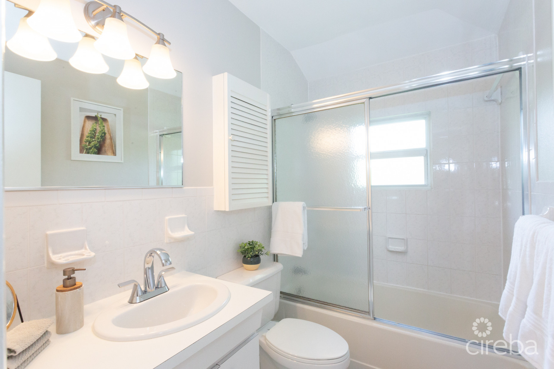 TURNKEY 2BED PLUS DEN END UNIT TROPICAL HAVEN