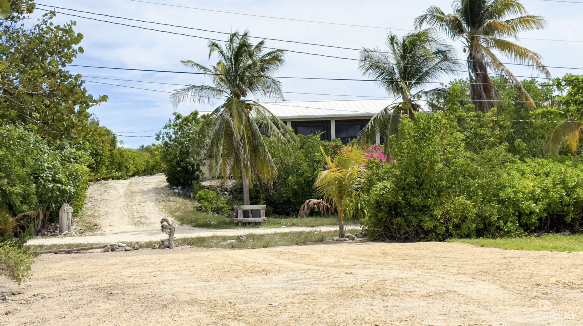LITTLE CAYMAN OCEAN VIEW RESIDENTIAL HOME W/ BEACHFRONT LOT JUST SHY OF 1 ACRE