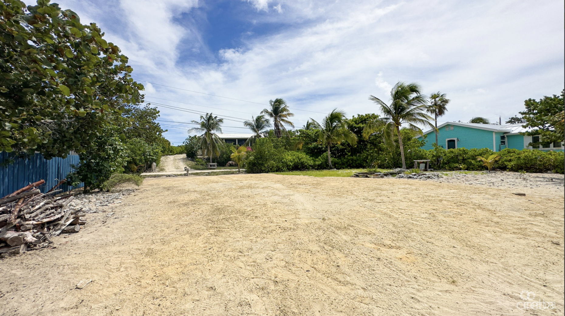 LITTLE CAYMAN OCEAN VIEW RESIDENTIAL HOME W/ BEACHFRONT LOT JUST SHY OF 1 ACRE