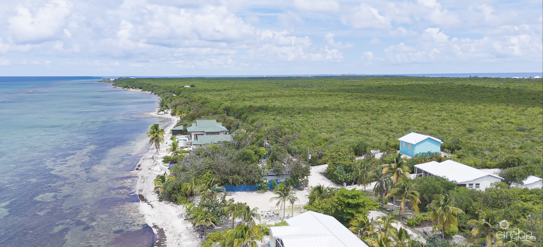 LITTLE CAYMAN OCEAN VIEW RESIDENTIAL HOME W/ BEACHFRONT LOT JUST SHY OF 1 ACRE