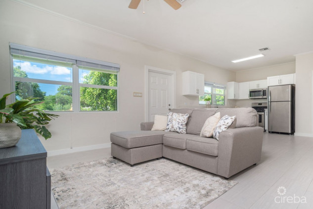 BEAUTIFULLY RENOVATED 3BED HOME WITH DEN + INCOME PRODUCING 1 BED APARTMENT