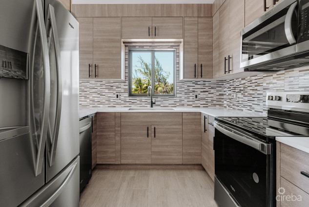 KINGSLEY TOWNHOMES 2 BED PLUS DEN UNIT 3.