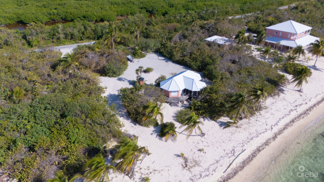 LITTLE CAYMAN LAND WITH BEACHFRONT COTTAGE