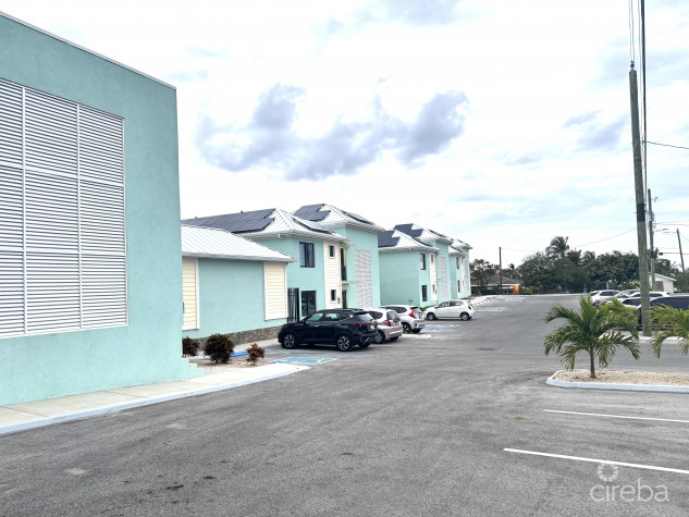 INCOME-PRODUCING RESIDENTIAL PORTFOLIO --4 STUDIOS IN WEST BAY