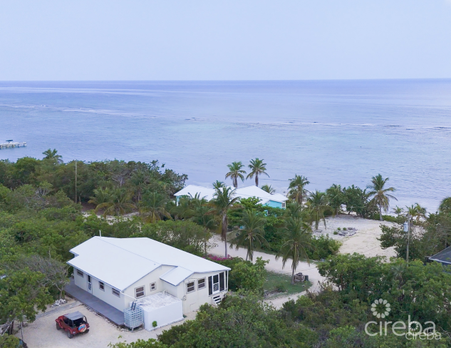 LITTLE CAYMAN OCEAN VIEW RESIDENTIAL HOME W/ BEACHFRONT LOT JUST SHY OF 1 ACRE